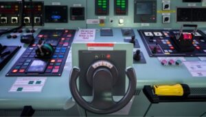 The steering console on the bridge, with the autopilot and rudder controls
